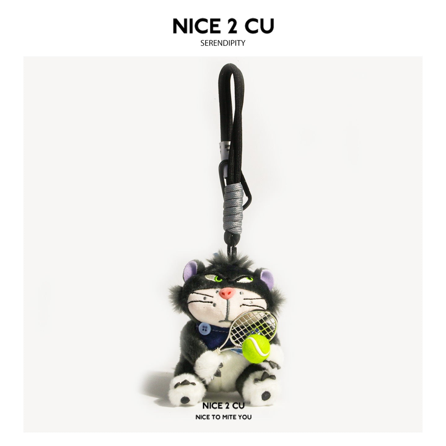 Fluffy black cat plush charm with green eyes, navy bow tie, and miniature tennis racket and ball on a carabiner clip