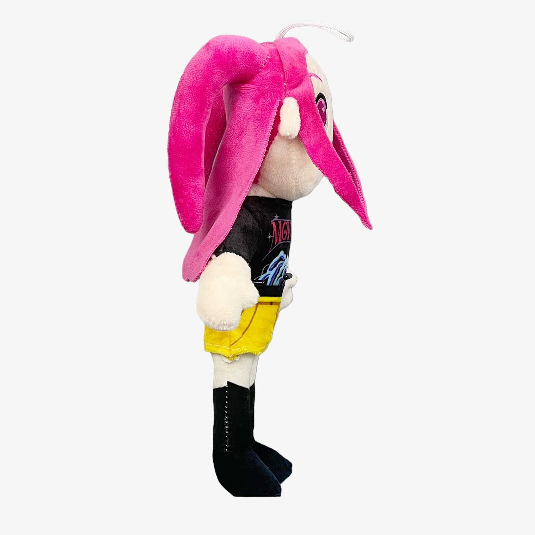 The Demon Hunters Anime Plush Doll is an 11-inch soft toy featuring a pink-haired female character in a black shirt with a colorful design, yellow shorts, and black boots—perfect for anime plush fans. Includes hanging loop.