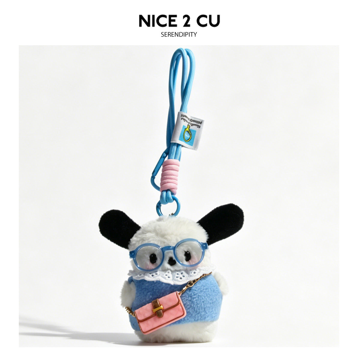 Plush dog bag charm in light blue outfit with round blue glasses and pink miniature handbag on blue clip cord
