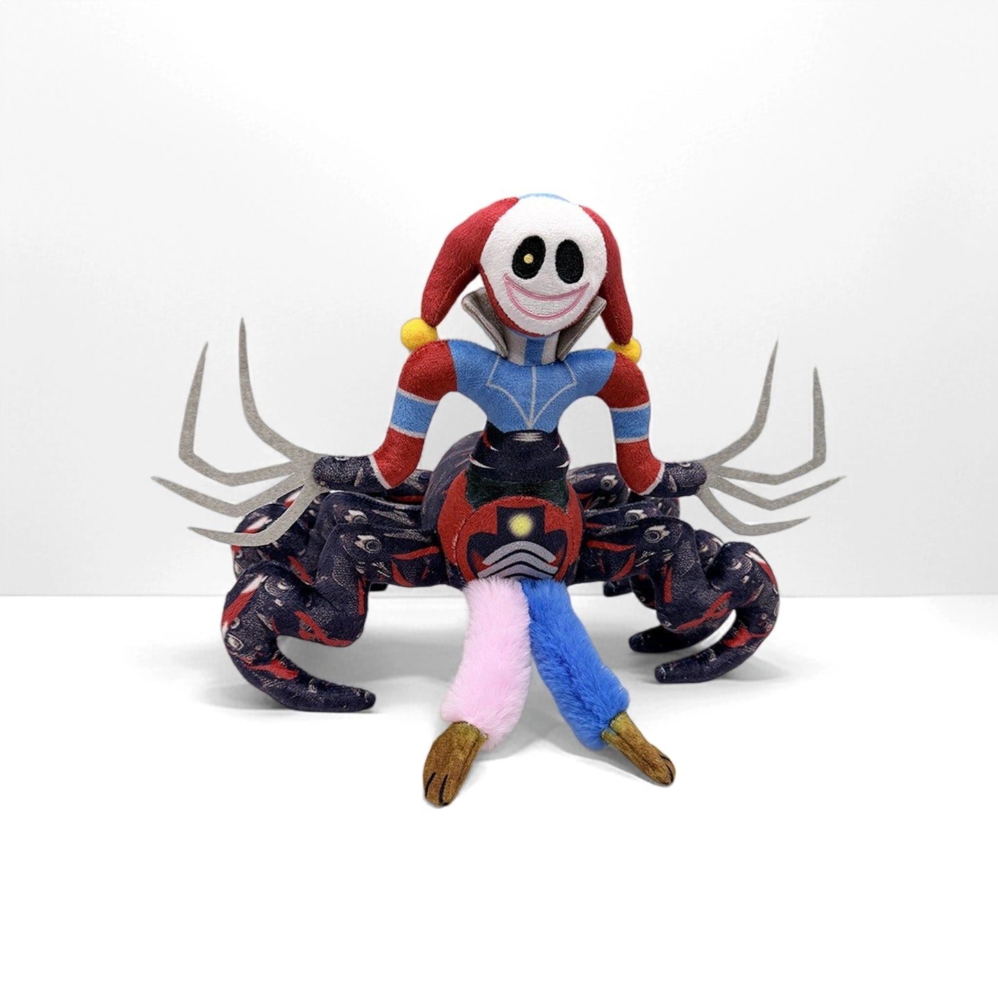 The ZoDoll Prototype Plush Poppy Playtime Horror Spider Monster Plush is a 32cm soft toy with a jester’s head, colorful limbs, and clawed legs—ideal for fans of game-inspired collectibles and the horror spider monster genre.