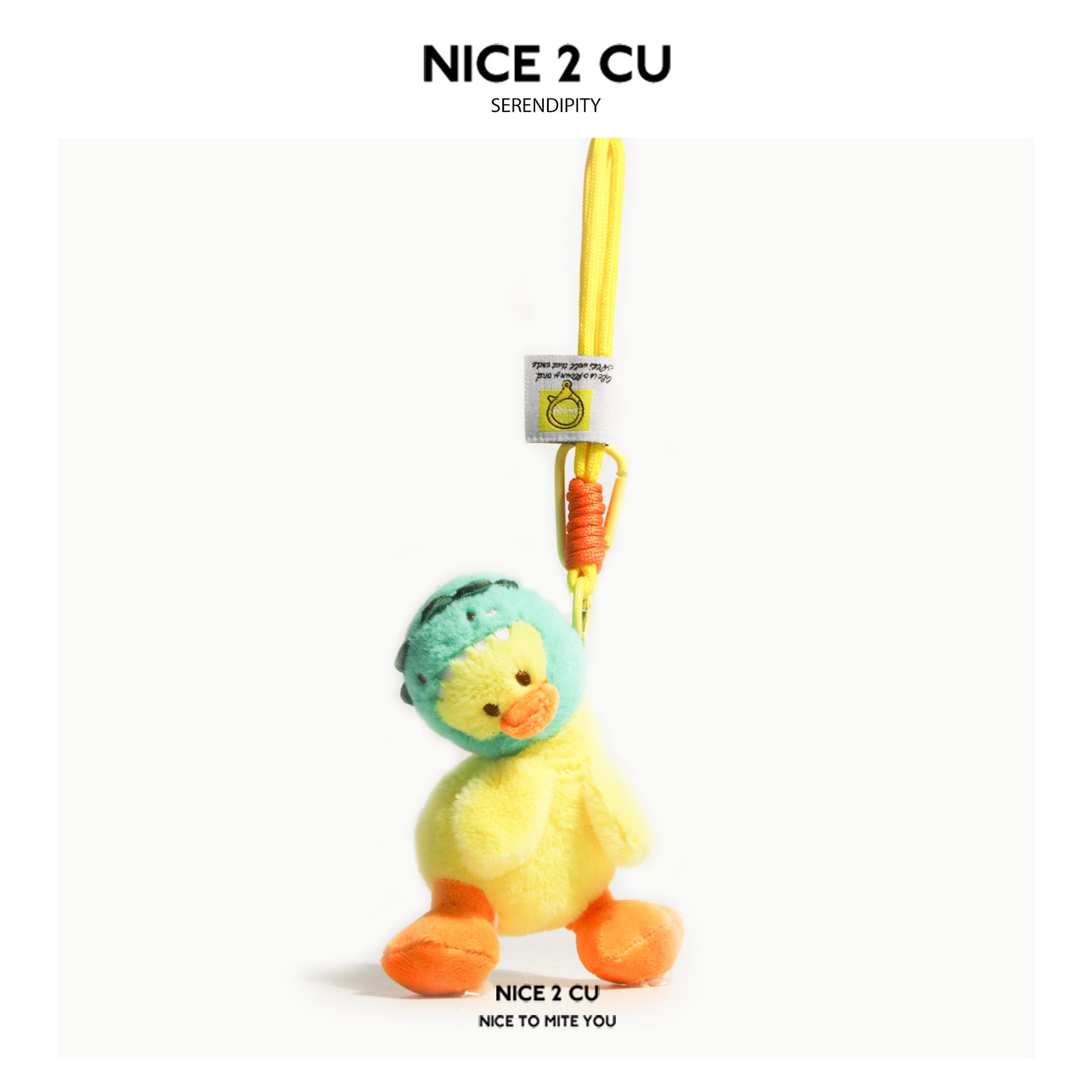 Yellow plush duck bag charm with green animal-ear hood hanging from orange carabiner clip