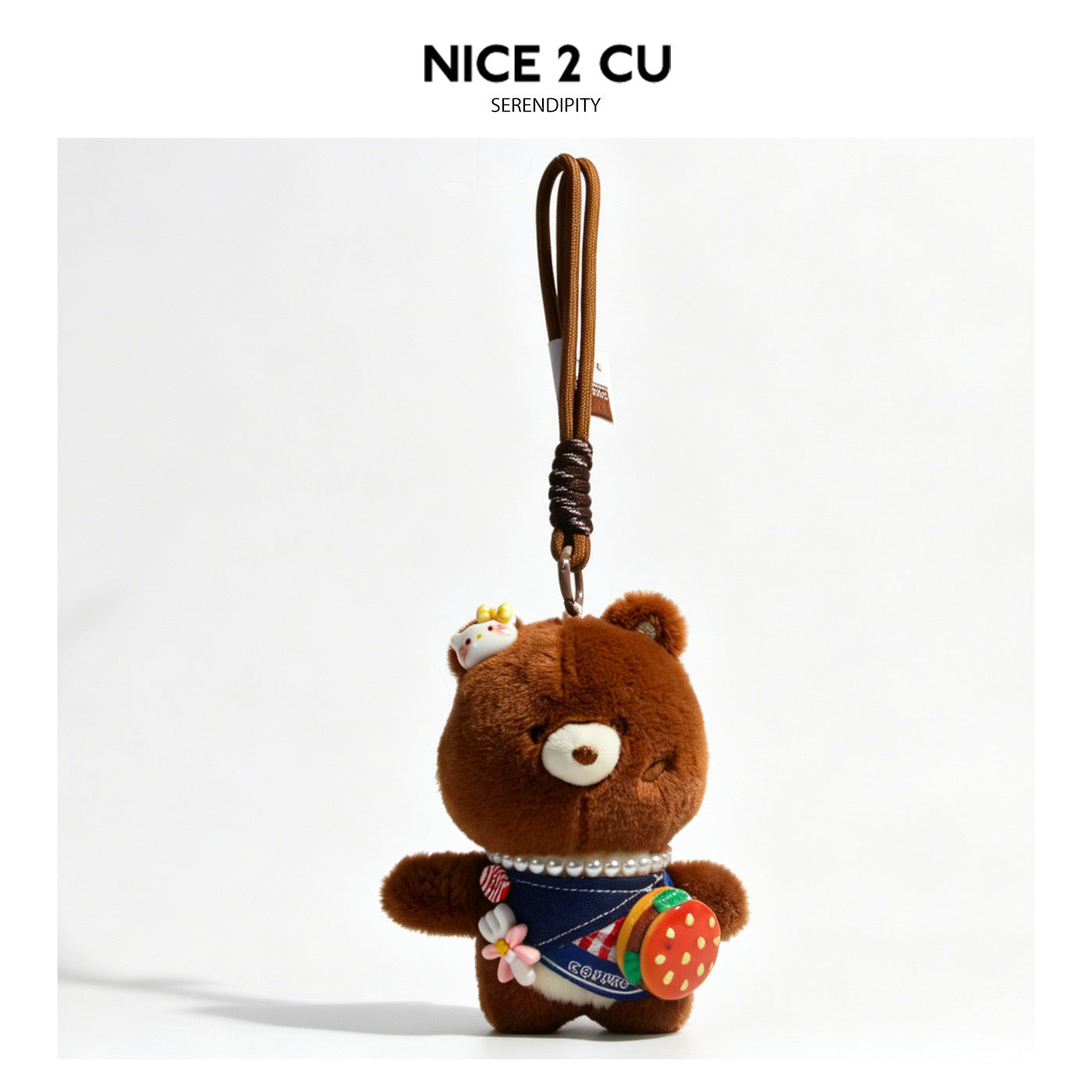 Kawaii dark brown plush bear charm wearing a navy apron and pearl necklace, holding a miniature hamburger, with braided cord 