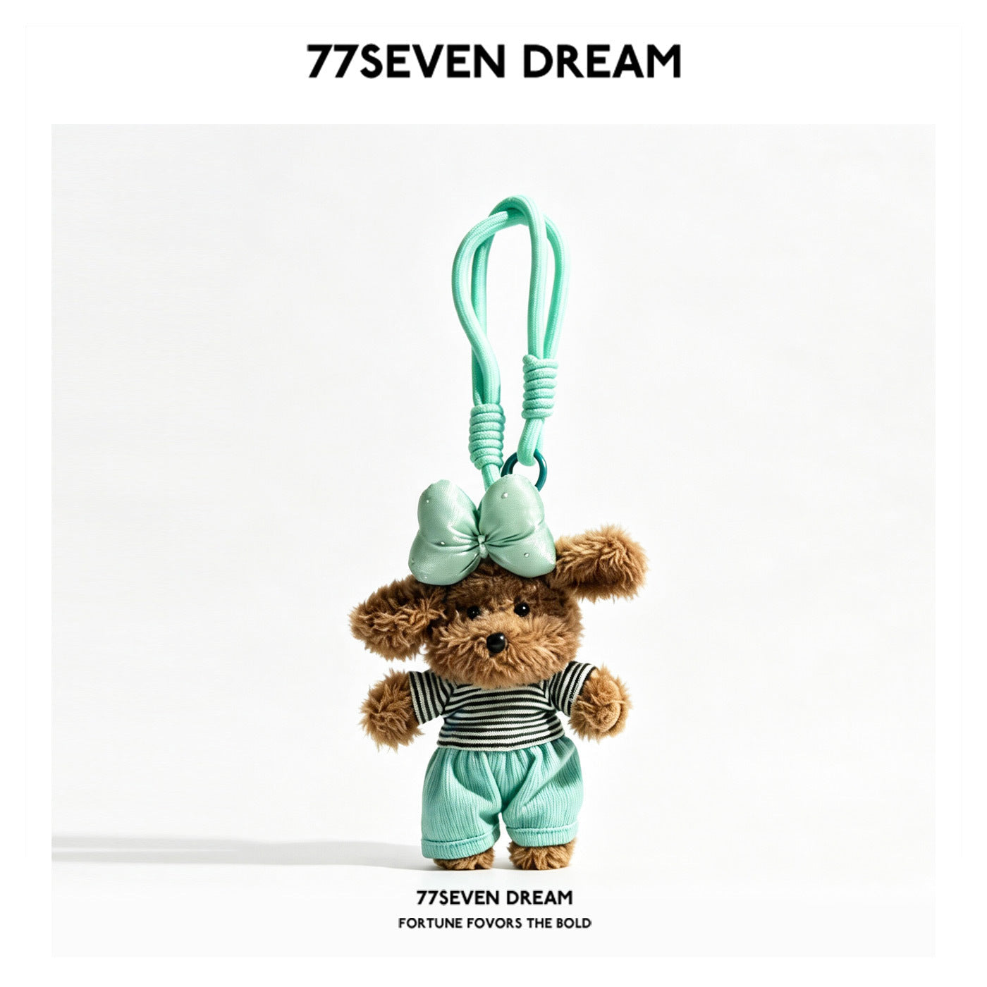 Mint green plush puppy keychain charm wearing striped top, ribbed pants, and bow, with knotted cord loop