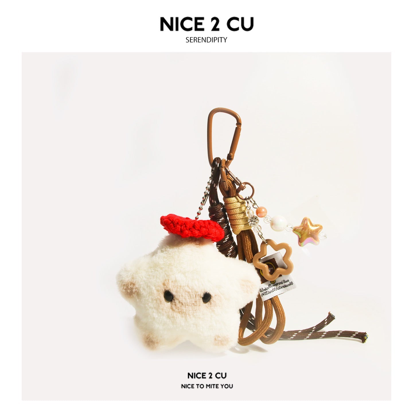Cream-white star-shaped kawaii cat plush charm keychain with iridescent star resin charm and braided brown cord