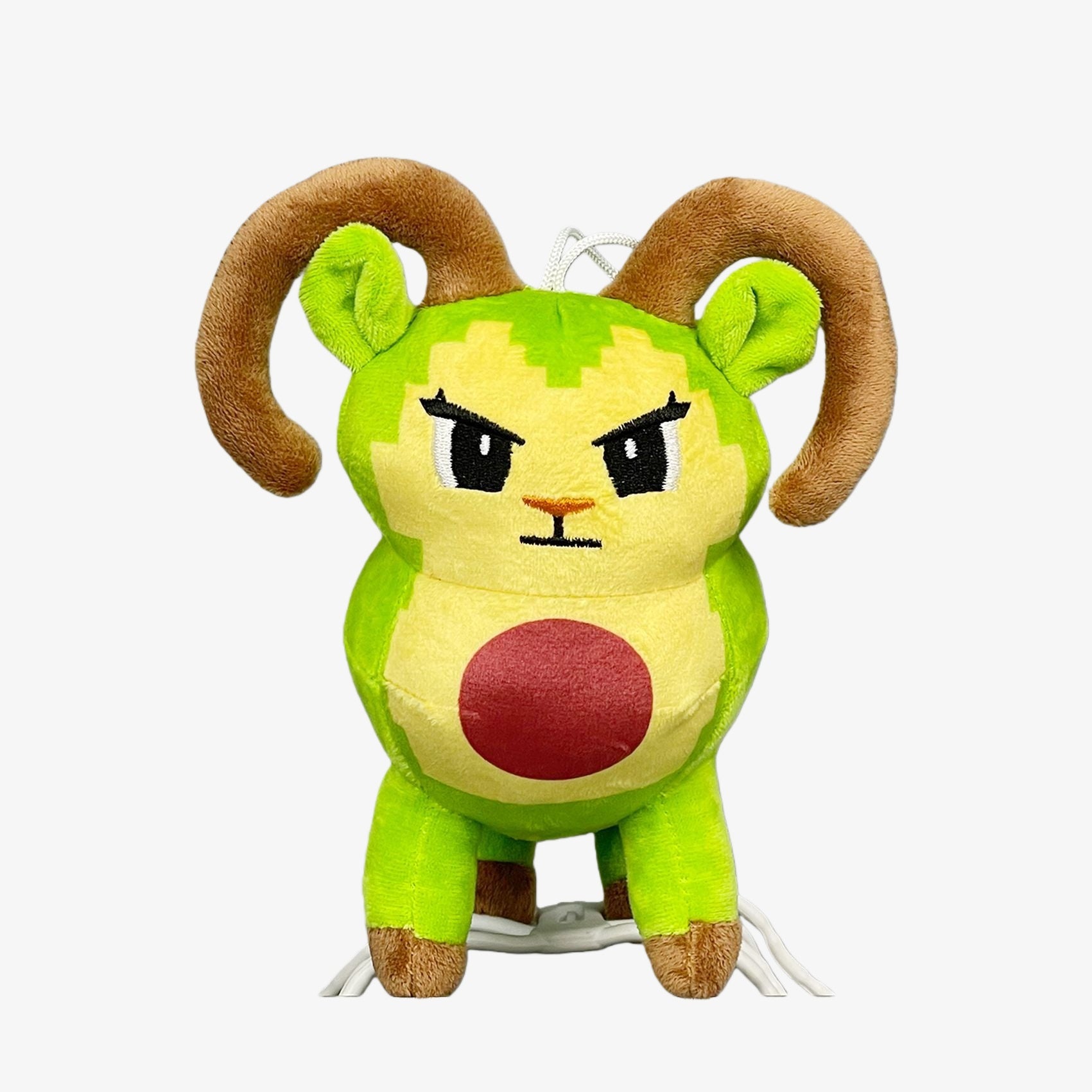 The Steal a Brainrot Inspired Green Ram Plush Toy is an 8.3-inch horned animal doll with large brown curled horns, a red belly circle, and an angry face—perfect for collectible plush fans.