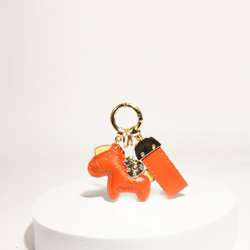 Orange-red 3D horse keychain charm with matching tag and gold-tone swivel clasp