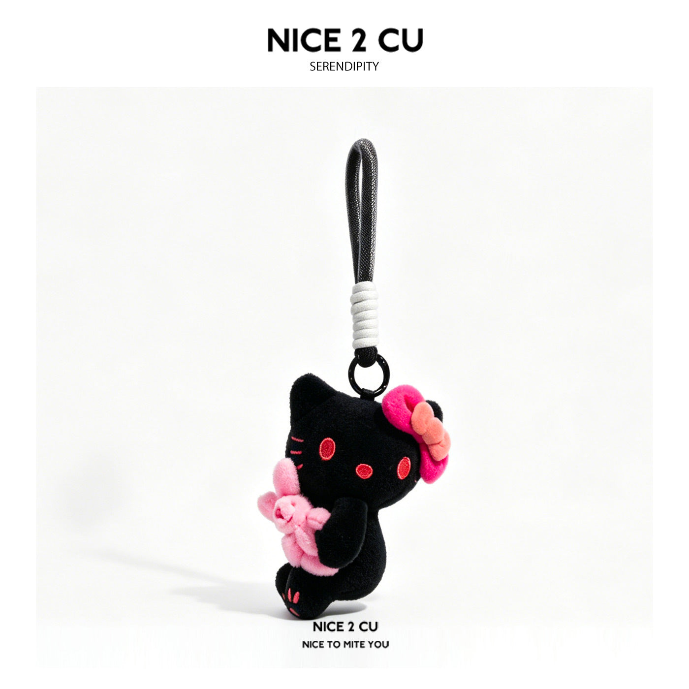 Black kawaii cat plush charm with hot-pink bow holding a small pink bunny, attached to a black loop strap with metal ring