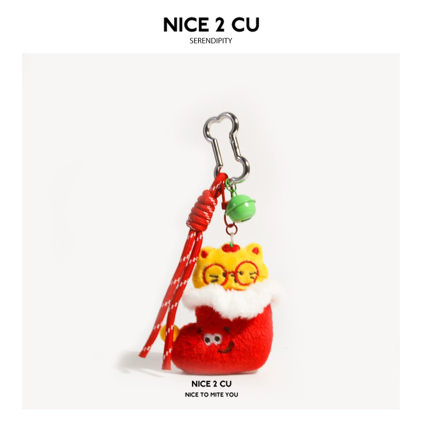 Cat-in-stocking plush keychain charm with yellow cat face, round glasses, and red Christmas stocking body