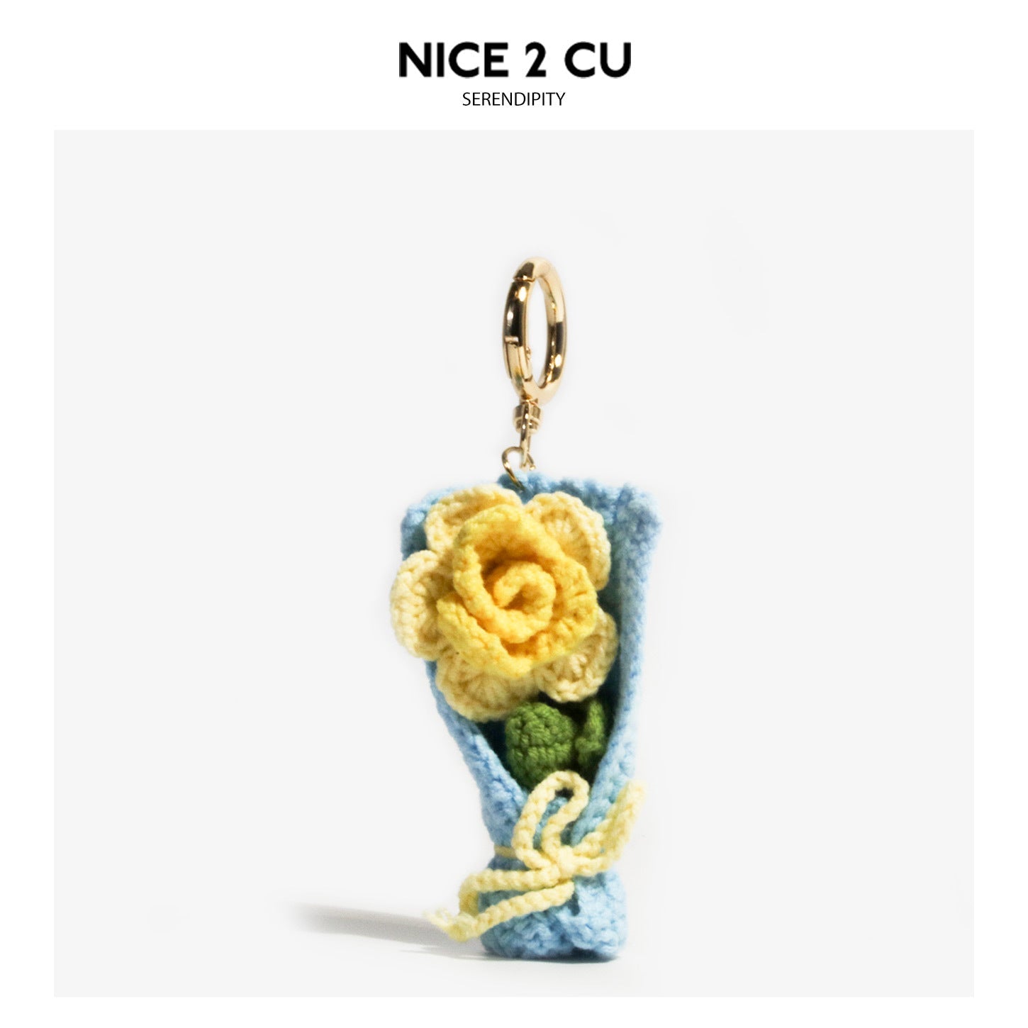 Crochet yellow rose bouquet keychain pendant with light blue wrapping and gold-tone ring