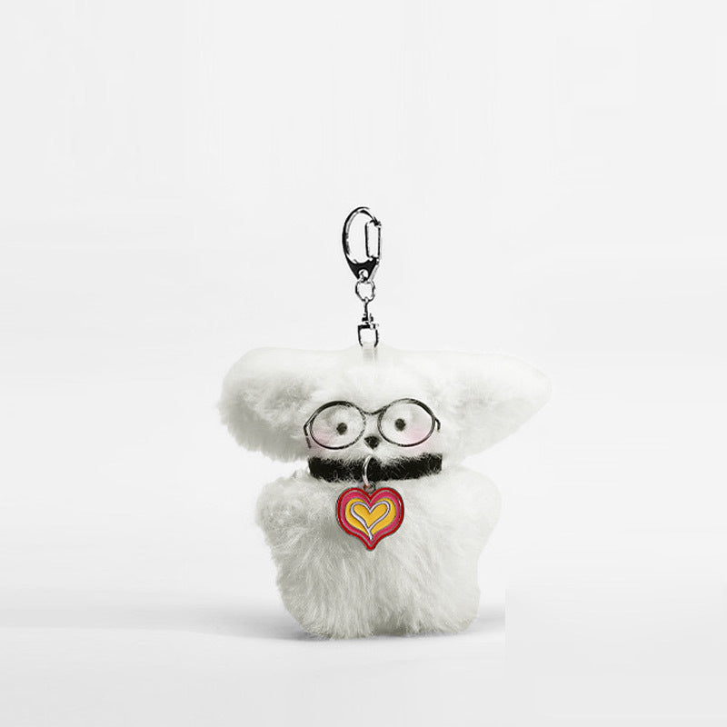 Fluffy white dog plush keychain charm with round black glasses and multicolor ripple heart pendant