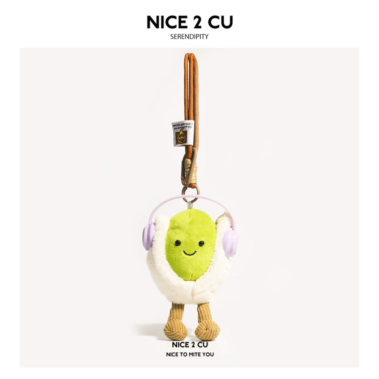 Pistachio nut plush charm with light purple headphones and cream fluffy shell