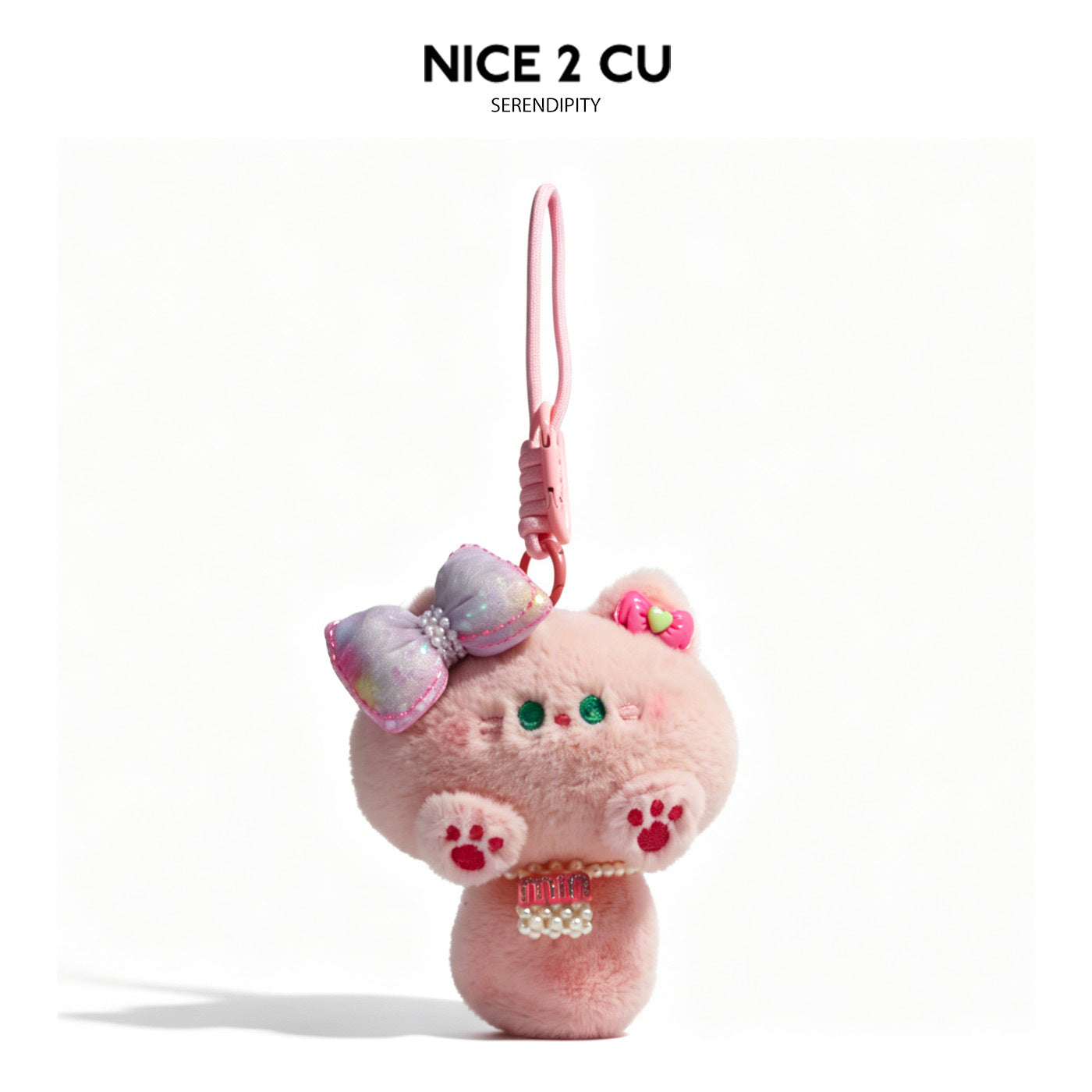 Pink fluffy kawaii plush cat charm with iridescent lavender bow, faux pearl beads, and pink clip hook