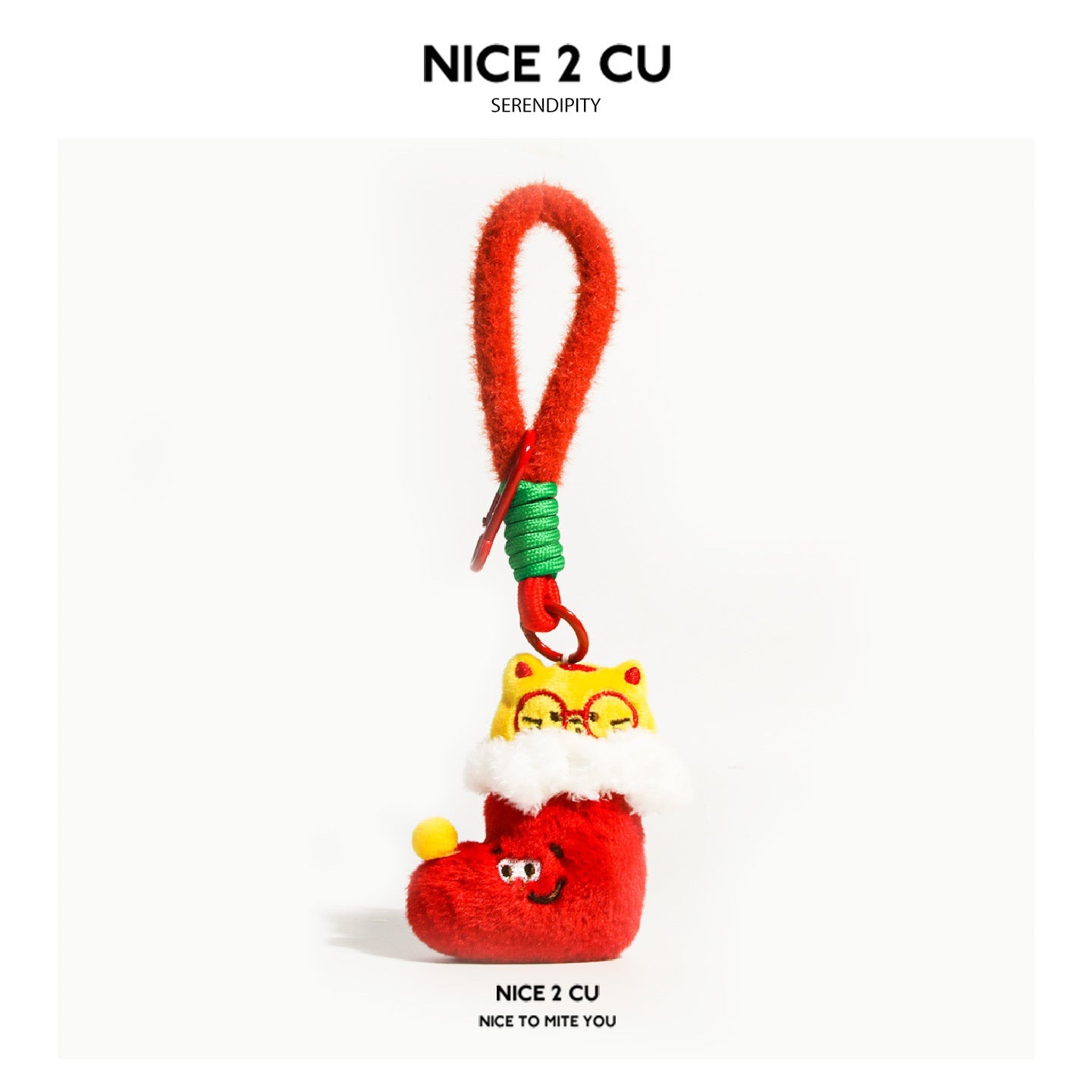 Christmas stocking cat plush charm with red stocking body, yellow cat face, and white fluffy trim on a red loop