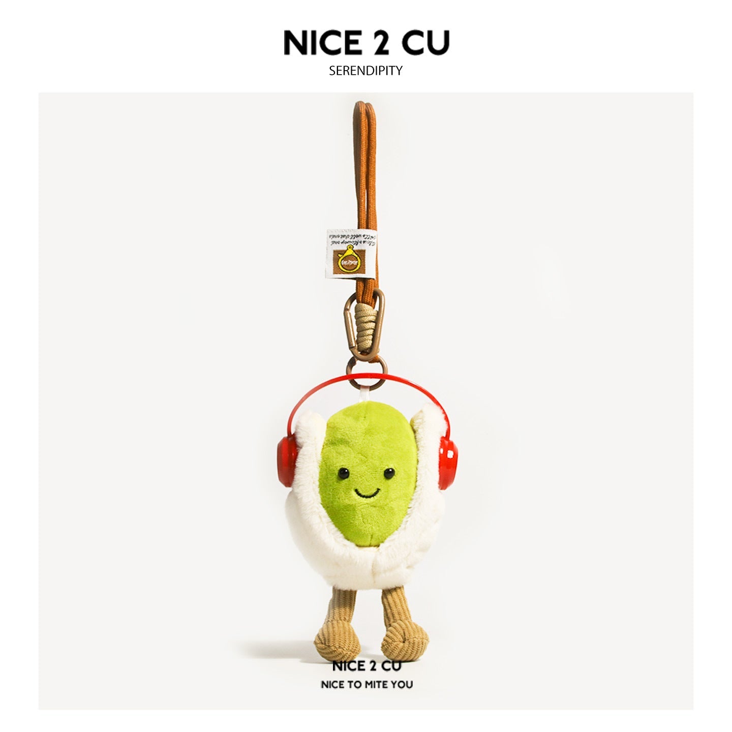 Pistachio plush keychain charm featuring red headphones and embroidered smiling face