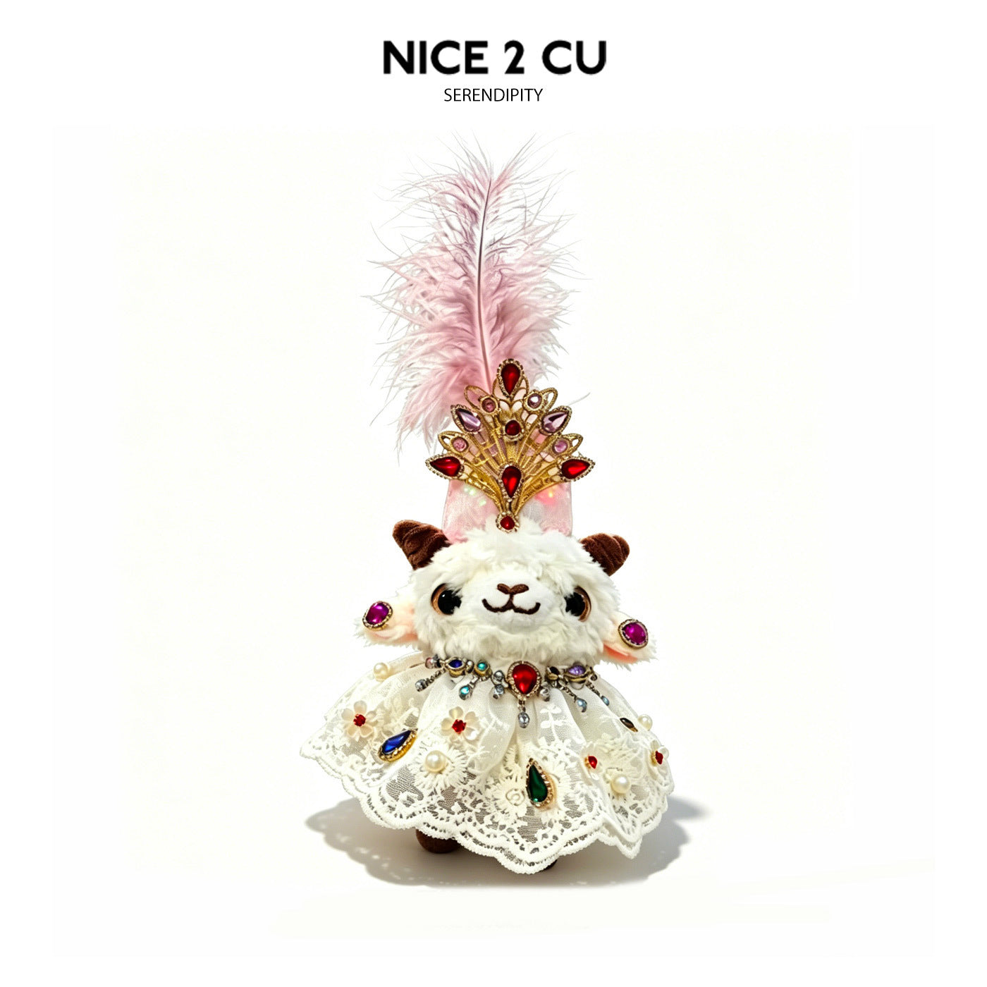Plush lamb figurine in white lace dress with peacock-style gold jeweled crown and pink feather topper