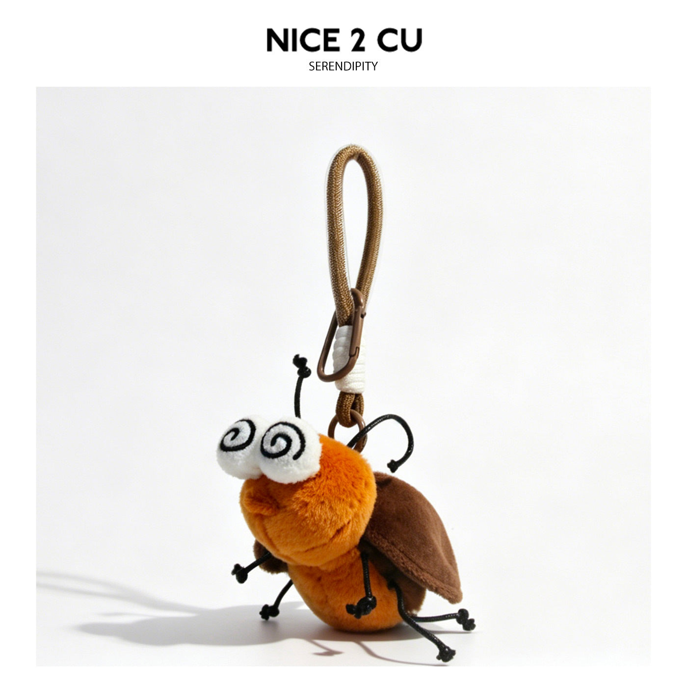 Orange and brown cockroach plush keychain with large spiral eyes and clip loop attachment
