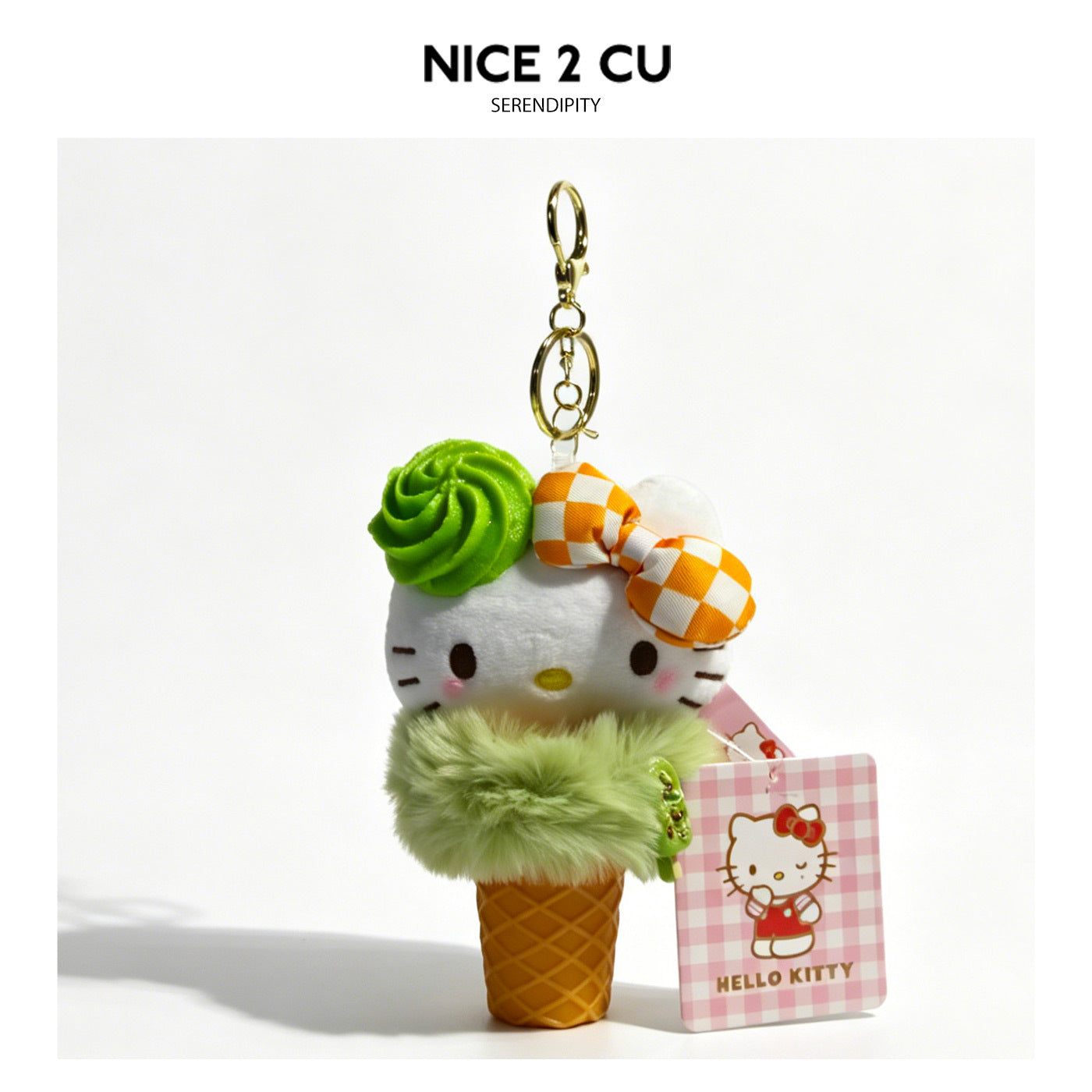 Hello Kitty matcha ice cream cone plush keychain charm with green swirl topping, orange checkered bow, and gold clasp