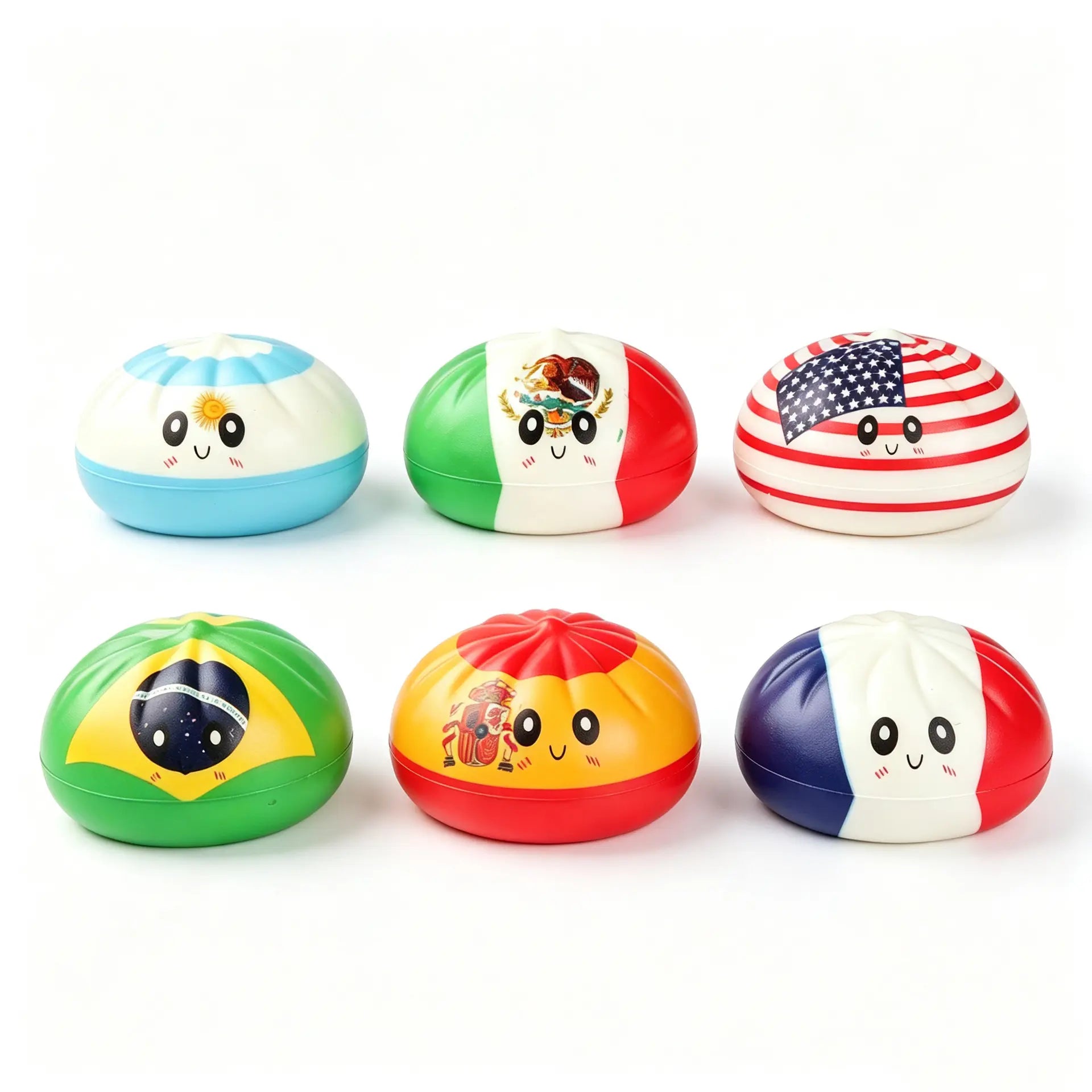 Six ZoDoll FIFA World Cup 2026 Squishy Dumpling Fidget Toys with Argentina, Mexico, USA, Brazil, Spain, and France flag designs are arranged in two rows on a white background, resembling a soccer field stripe.