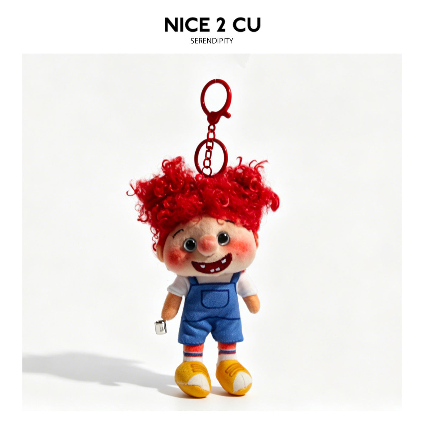 Red curly-hair freckled boy plush doll keychain wearing blue overalls and yellow shoes