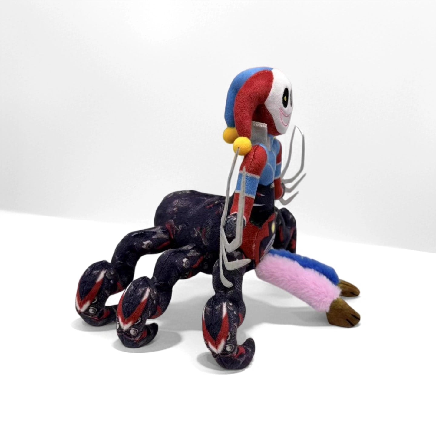 The ZoDoll Prototype Plush Poppy Playtime Horror Spider Monster is a 32cm soft stuffed toy with a jester head, colorful body, and four spider-like legs—perfect for fans of the eerie game-inspired collectible.