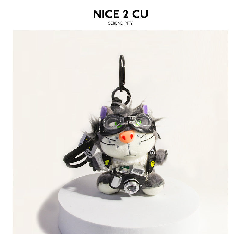 Plush photographer cat charm in white cream sweater with green eyes and orange nose