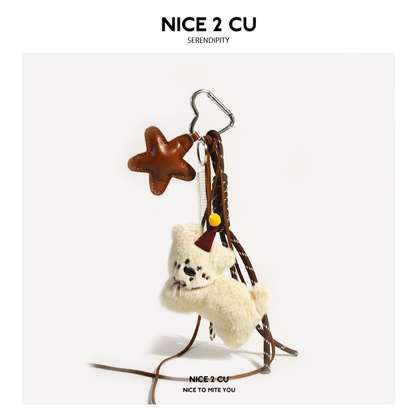 Cream plush dog with brown hat and single brown leather-look star charm on braided brown cords with silver heart clasp