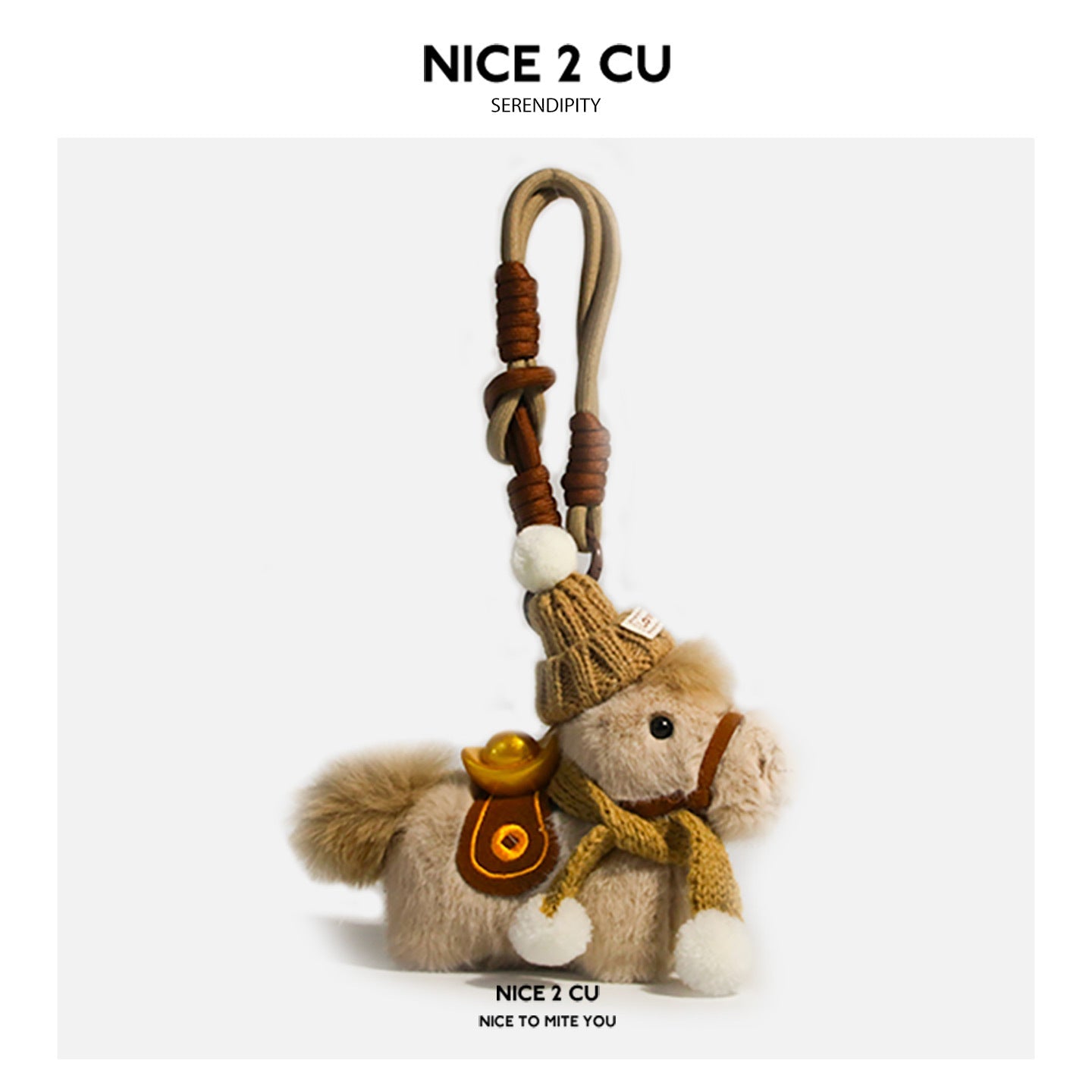 Light brown plush horse ornament with brown knitted cap, brown scarf, white pompoms, and wrist cord attachment