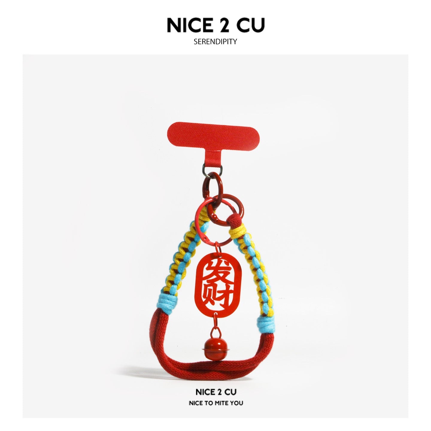 Red Lunar New Year bag charm with braided yellow and blue cord and oval plaque reading 发财 (prosperity)
