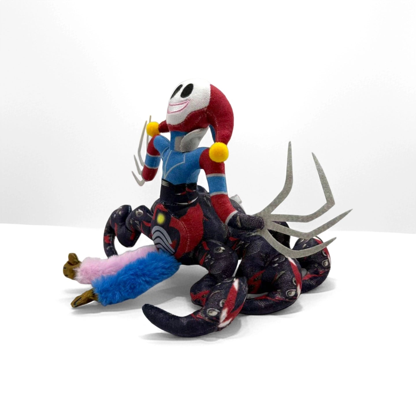 The ZoDoll Prototype Plush Poppy Playtime Horror Spider Monster Plush is a 32cm soft toy inspired by Poppy Playtime, featuring a smiling face, yellow pom-poms, blue chest, and spider-like legs with clawed feet.