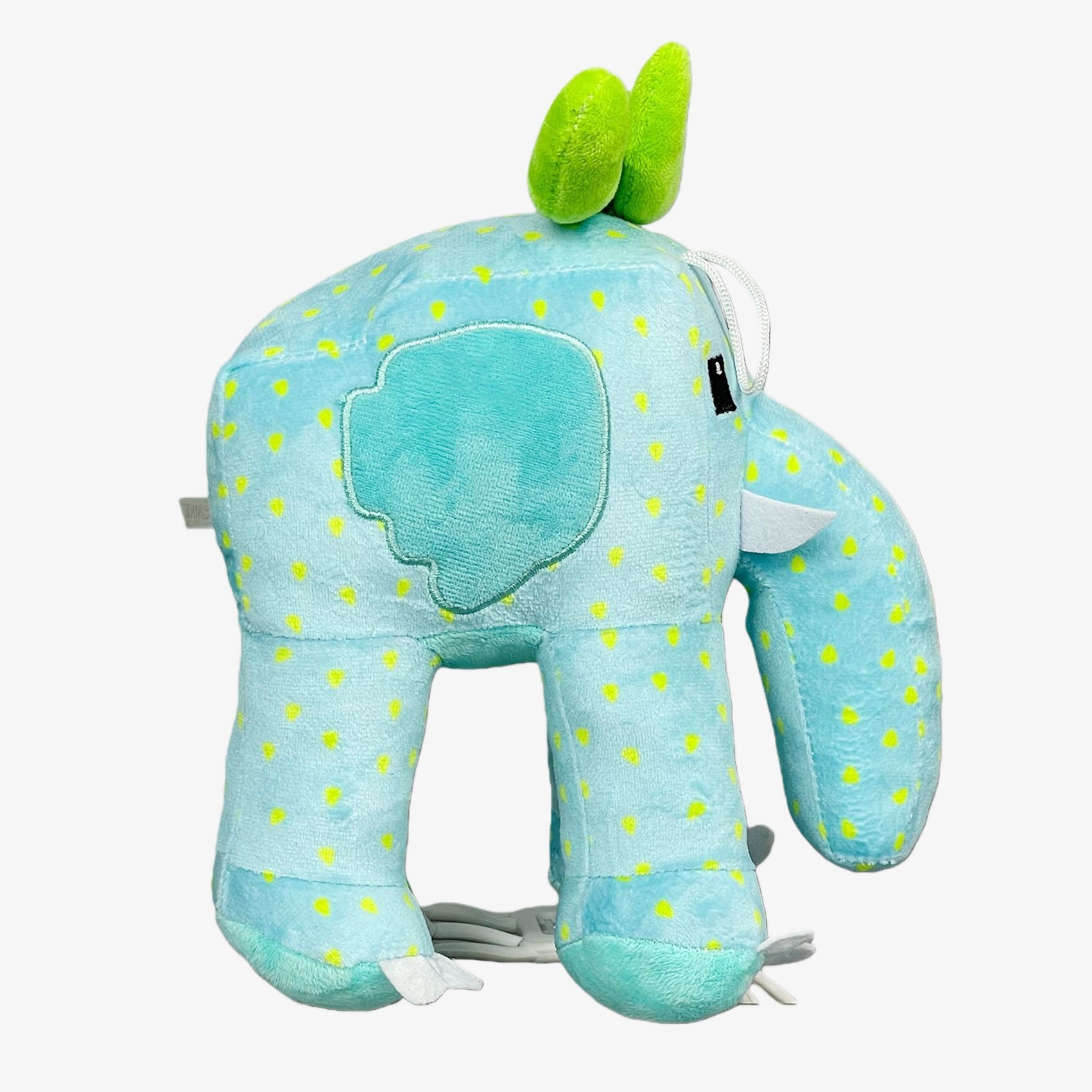 A light blue Steal a Brainrot Inspired Strawberry Elephant Plush Toy, 9.8 inches, featuring yellow spots, green head accents, white tusks, and a side view—collectible fruit animal soft stuffed figure.