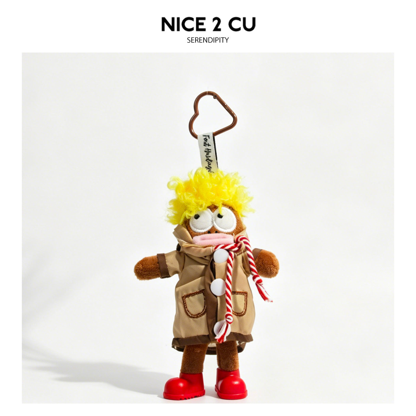Brown cartoon plush keychain pendant wearing khaki trench coat, red-and-white rope scarf, and red boots with heart-shaped car