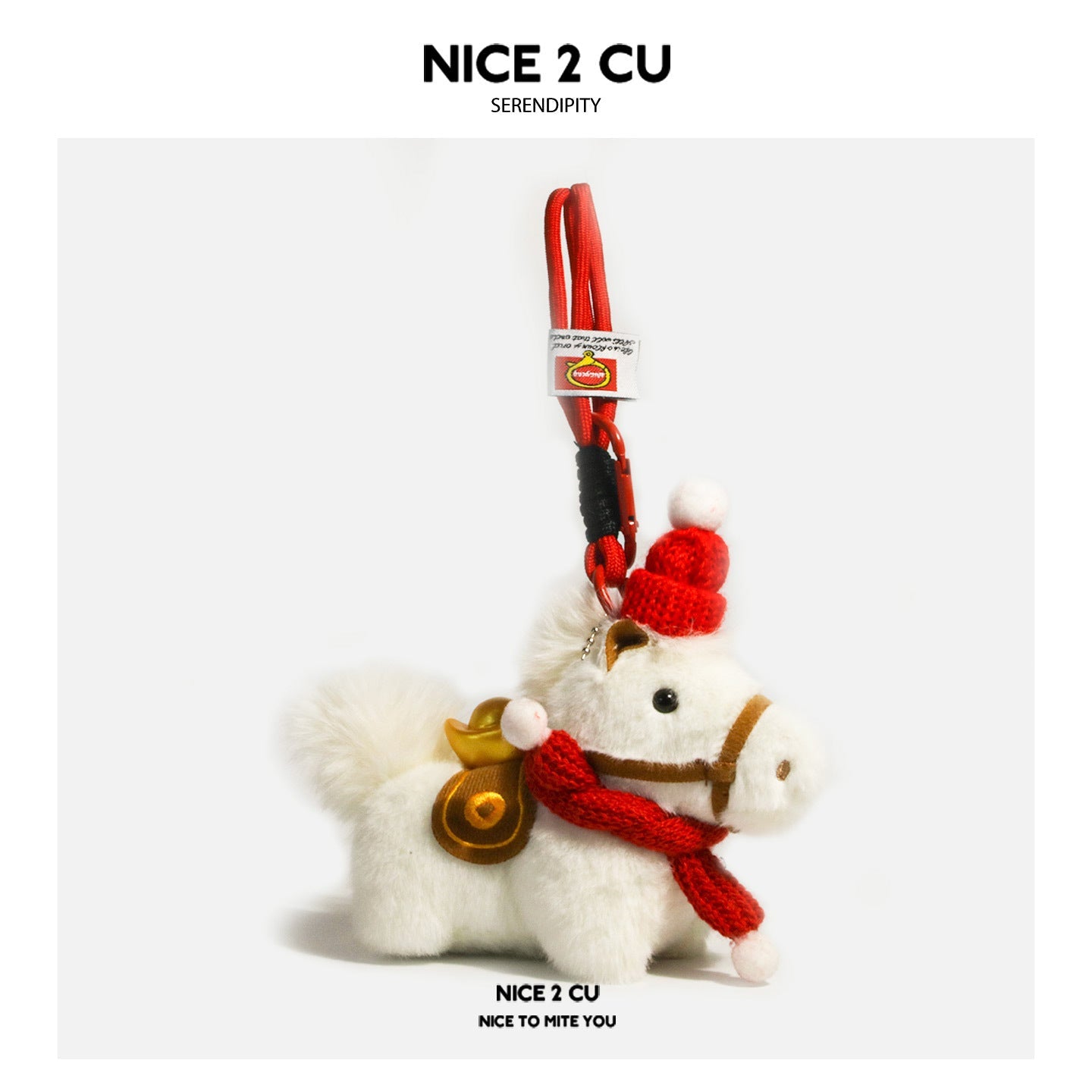 White plush horse ornament with solid red scarf, red hat, and carabiner hook attachment