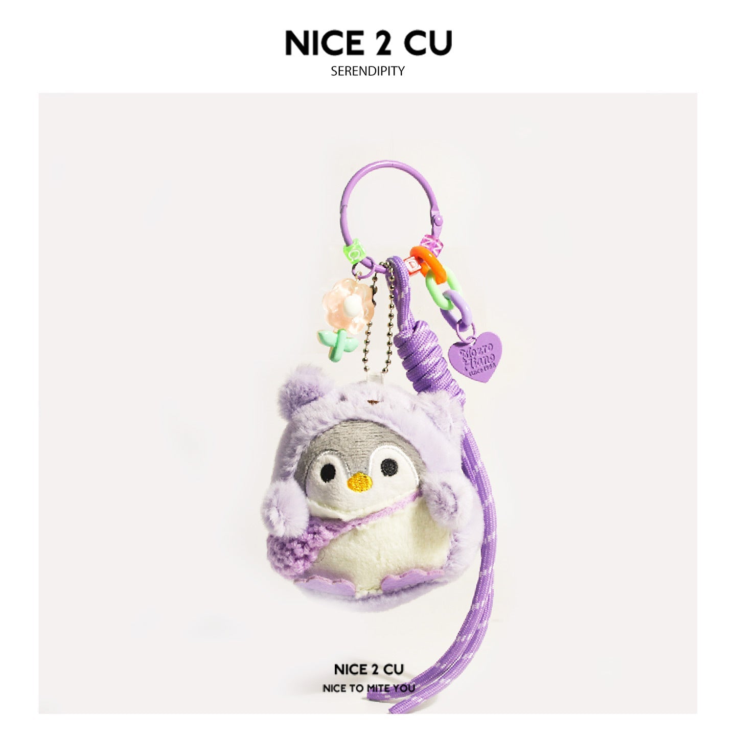 Kawaii plush penguin keychain in fluffy purple hooded costume with flower charm and colorful bead chain