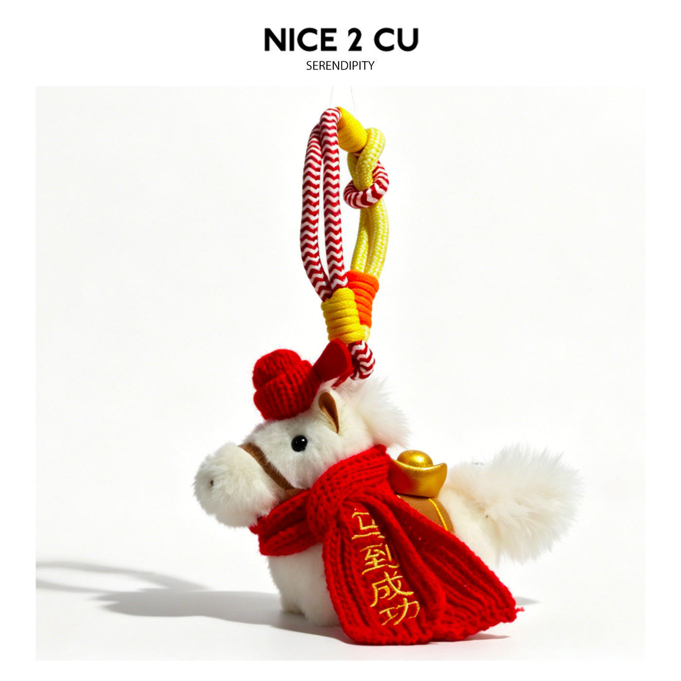 White plush horse charm with red knitted scarf featuring gold Chinese characters, red top ornament, and festive braided rope