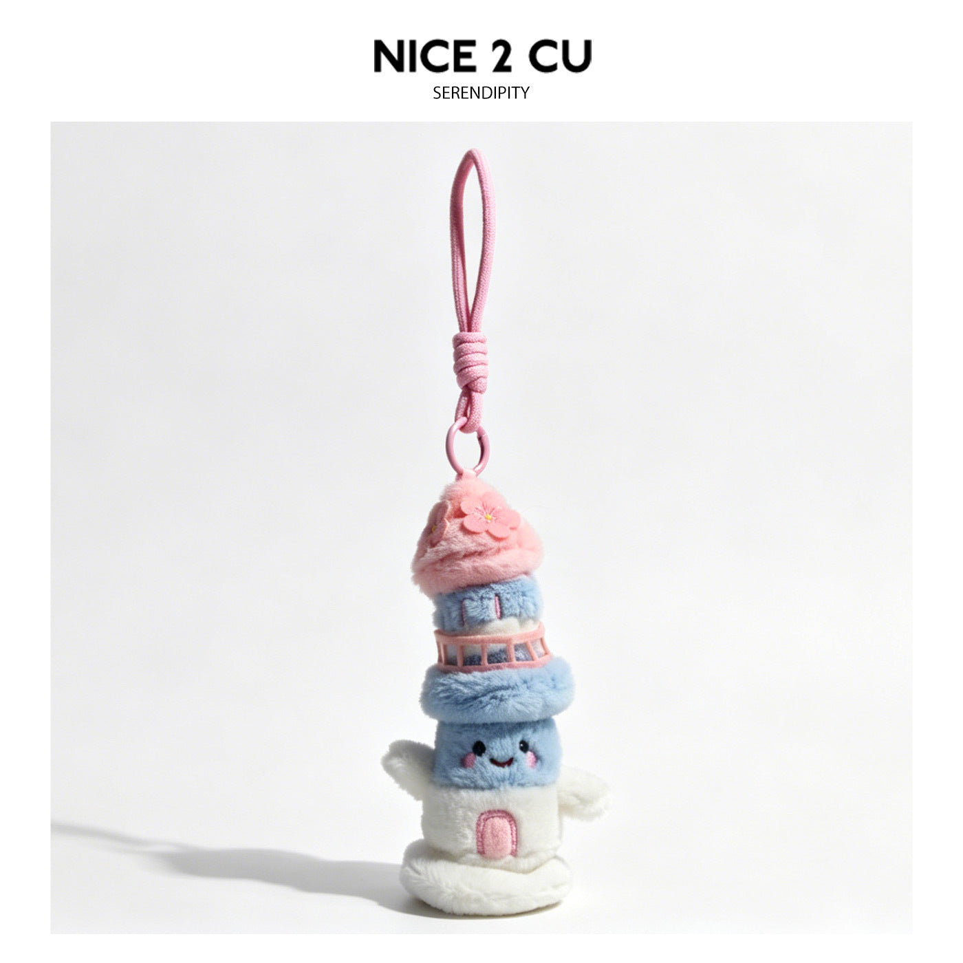Pink blue and white plush lighthouse charm with cherry blossom accent and loop strap