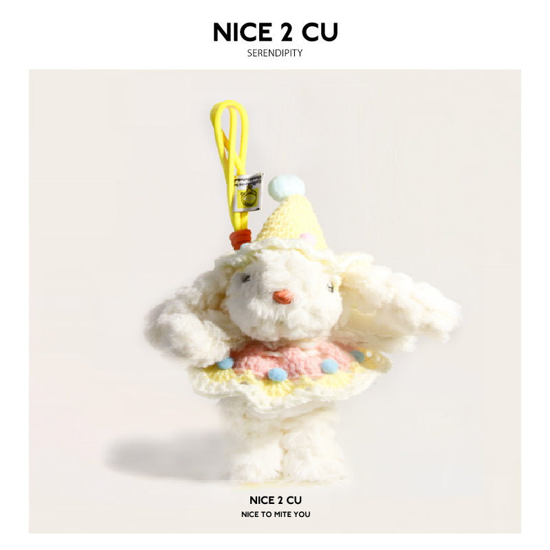 White plush rabbit charm in yellow knitted cone hat and pink-yellow colorful outfit with yellow hanging loop