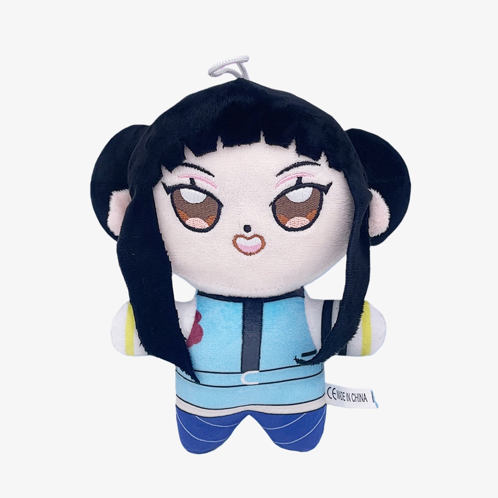 The Demon Hunters Anime Plush Doll is a 7-inch soft stuffed toy featuring a twin bun black-haired female character, embroidered eyes, blue outfit, hanging loop, and side tag. Perfect for fans of Demon Hunters and anime plush collections.