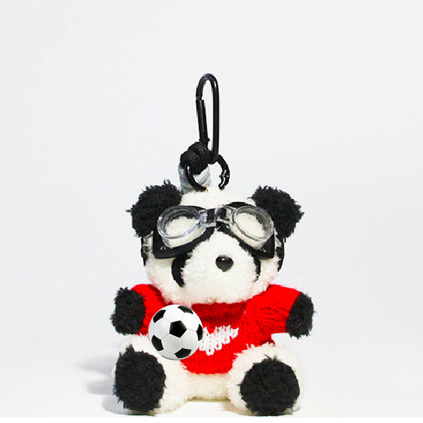 Panda plush charm wearing a bright red knit sweater with a white heart on the chest and clear goggles