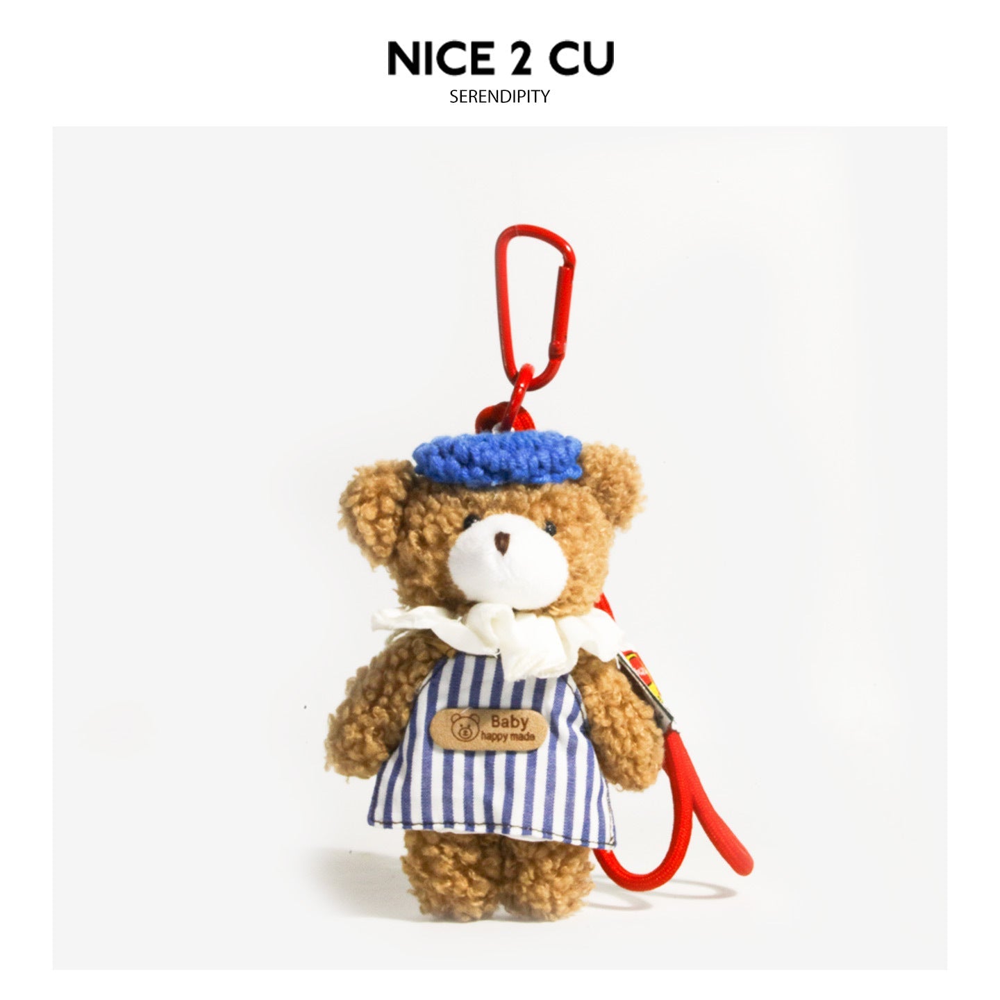 Curly plush teddy bear keychain charm wearing a blue beret and striped apron with red carabiner clip