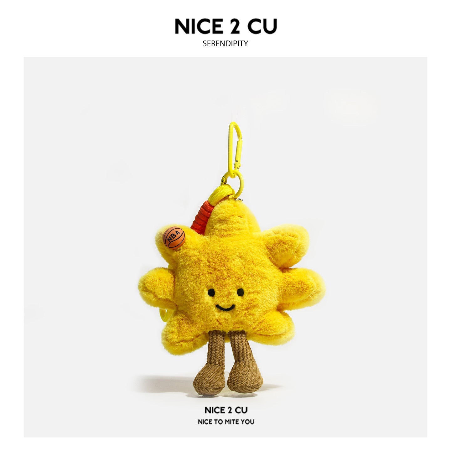 Yellow sunflower plush charm with a small basketball motif and yellow strap clip