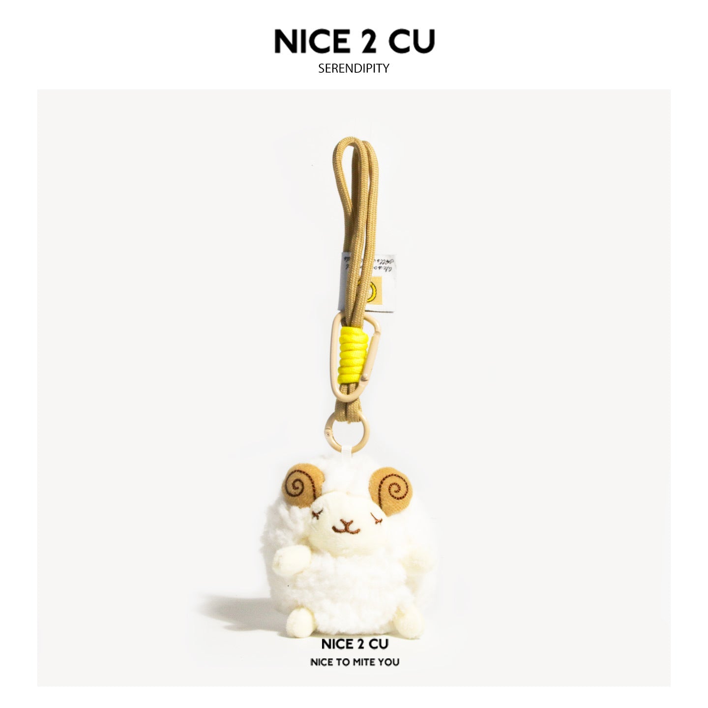White chubby sheep plush charm with spiral ram horns and gold carabiner clip on braided cord