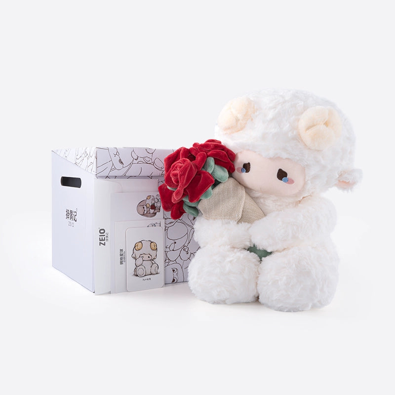 The ZEIO Rose-holding Lamb Plush Toy (29cm) – an adorable sheep doll with red roses – sits by a white box and illustrated cards on a light background, making a charming Valentine’s gift.