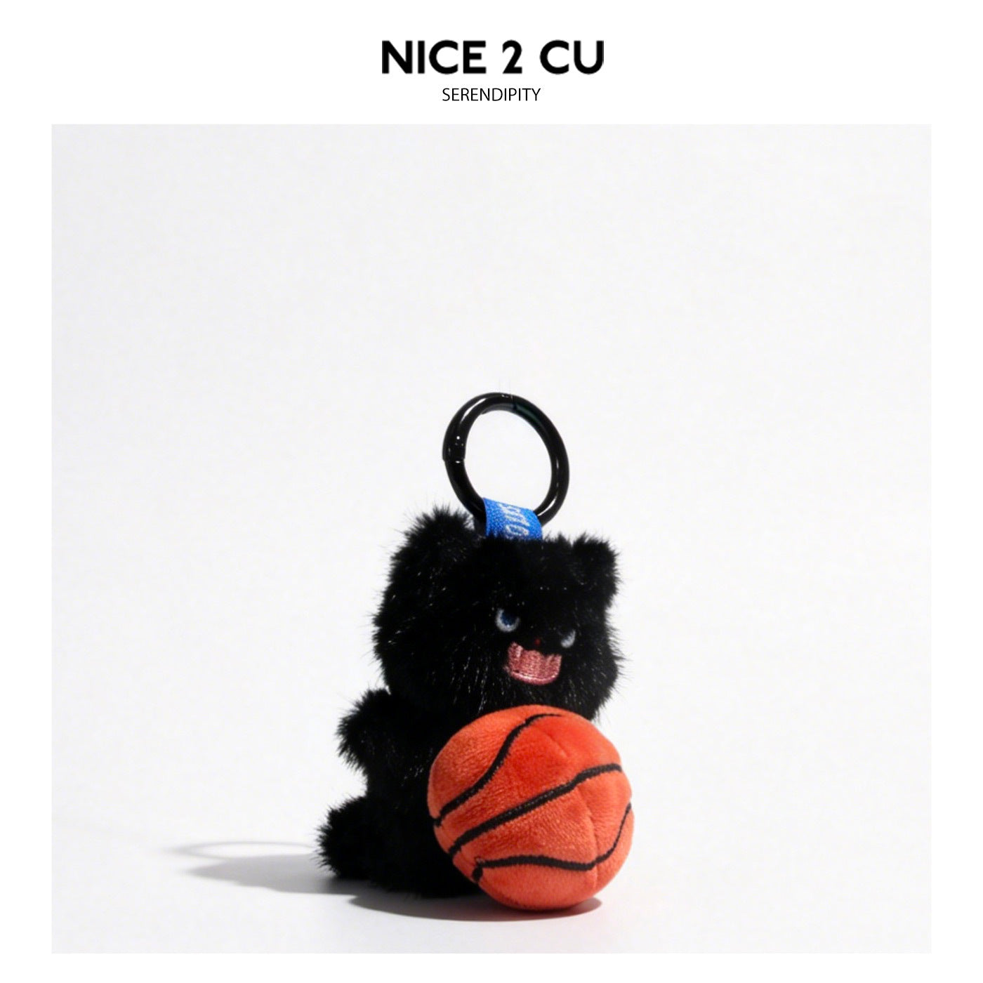 Black seated plush cat keychain holding an orange basketball with blue strap