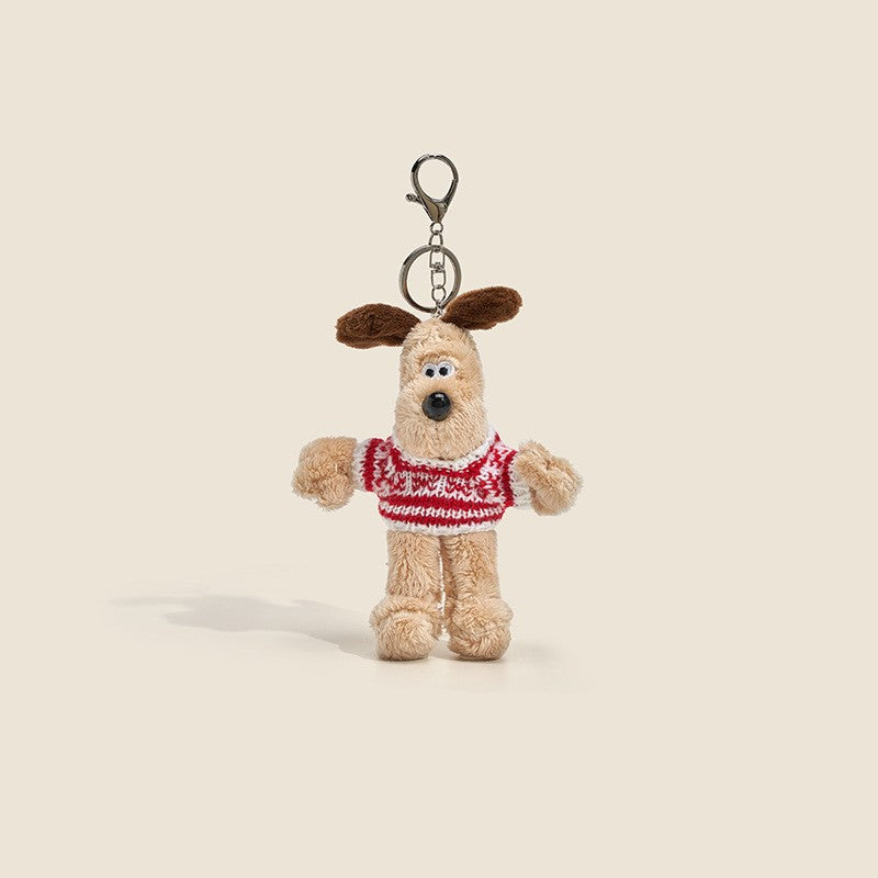 Long-fur cream dog plush charm wearing red and white striped knitted sweater