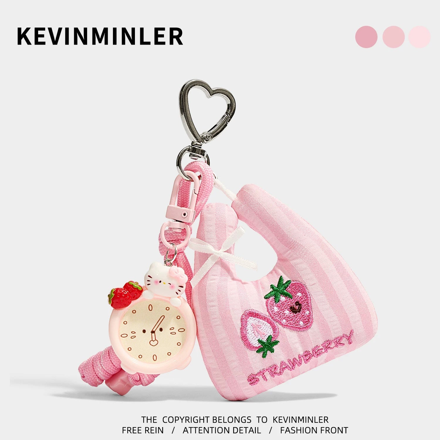Pink striped mini tote bag charm with strawberry clock motif, pink rope strap, and silver heart-shaped carabiner clip