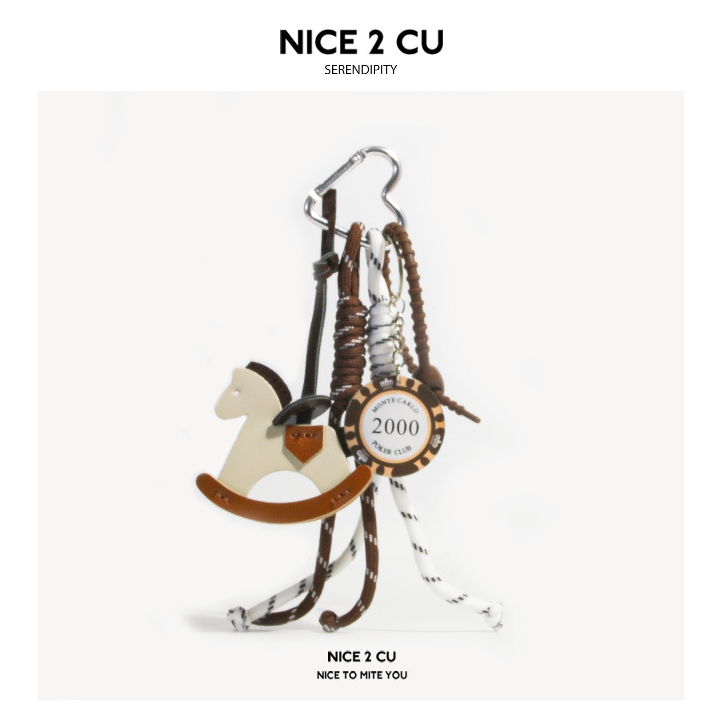 Cream and tan rocking horse bag charm with braided brown and white cords, casino-chip disc pendant, and silver carabiner clip