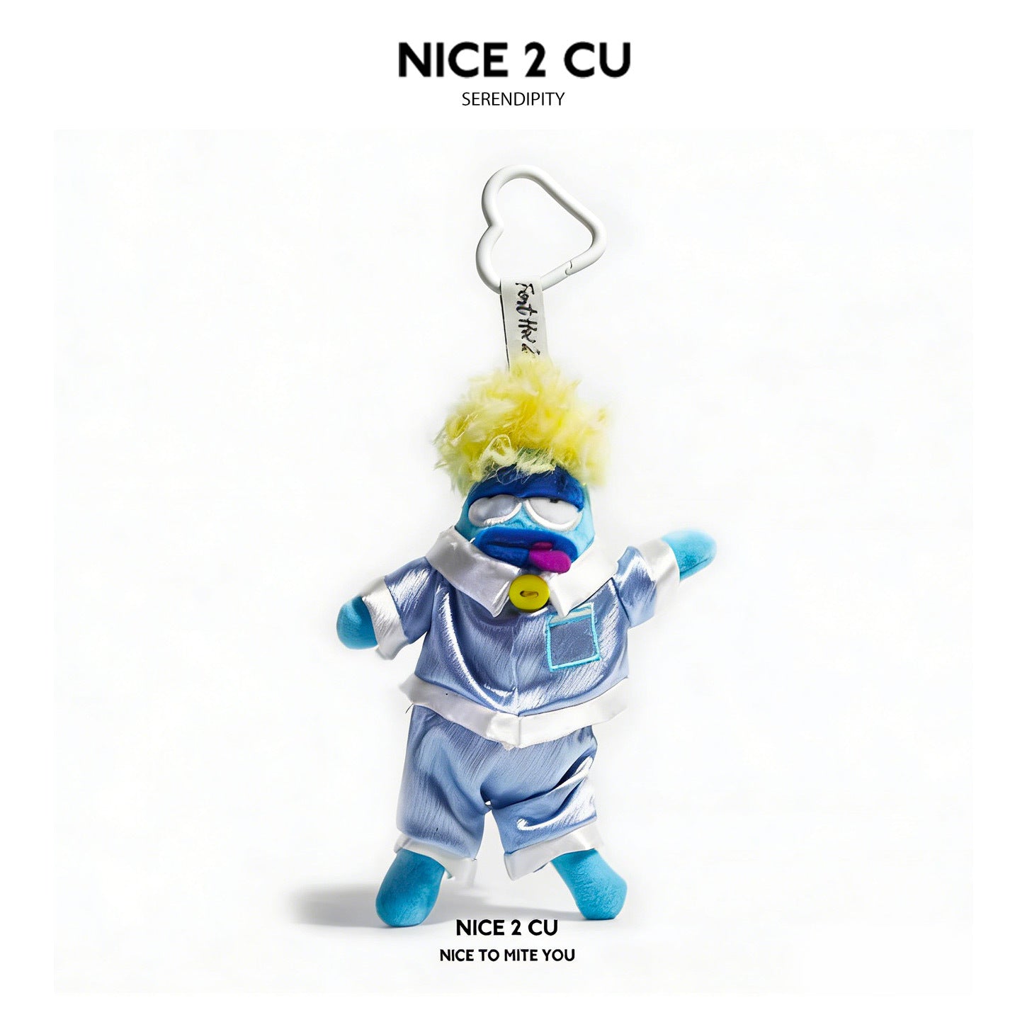 Serendipity plush character charm dressed in light blue pajama set with white trim and white heart-shaped clip
