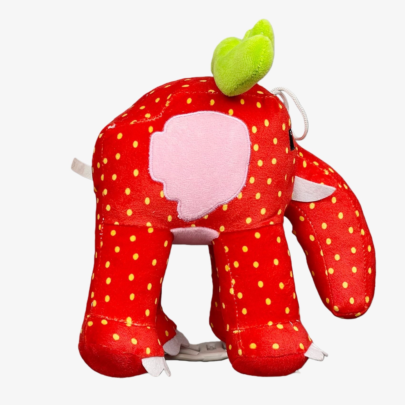The Steal a Brainrot Inspired Strawberry Elephant Plush Toy is a 9.8-inch fruit animal collectible with a trunk, soft cartoon design, and two color options. This cute plush by Steal a Brainrot makes an adorable addition to any collection.