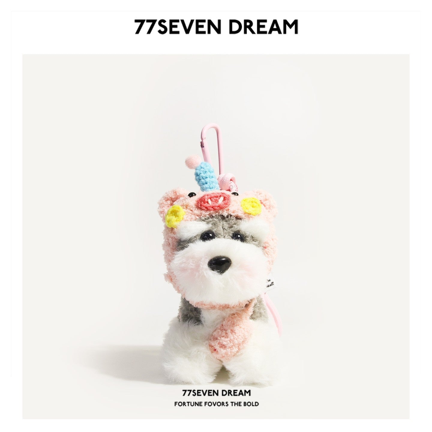 Schnauzer plush keychain wearing a pink pig-themed animal hood with blue snout detail and yellow flower accents