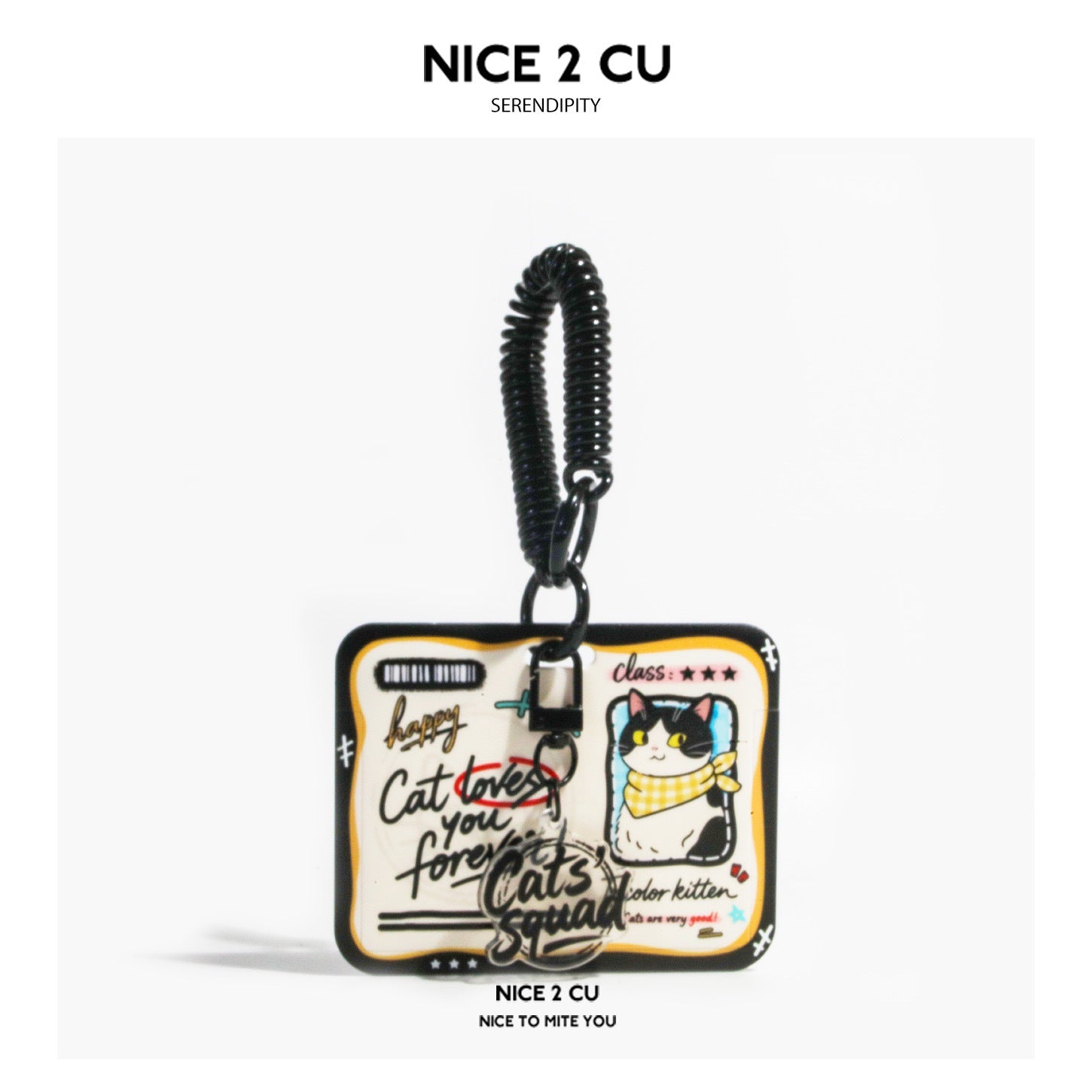 Black-and-white cow cat card holder with yellow-accented white front and black coil strap